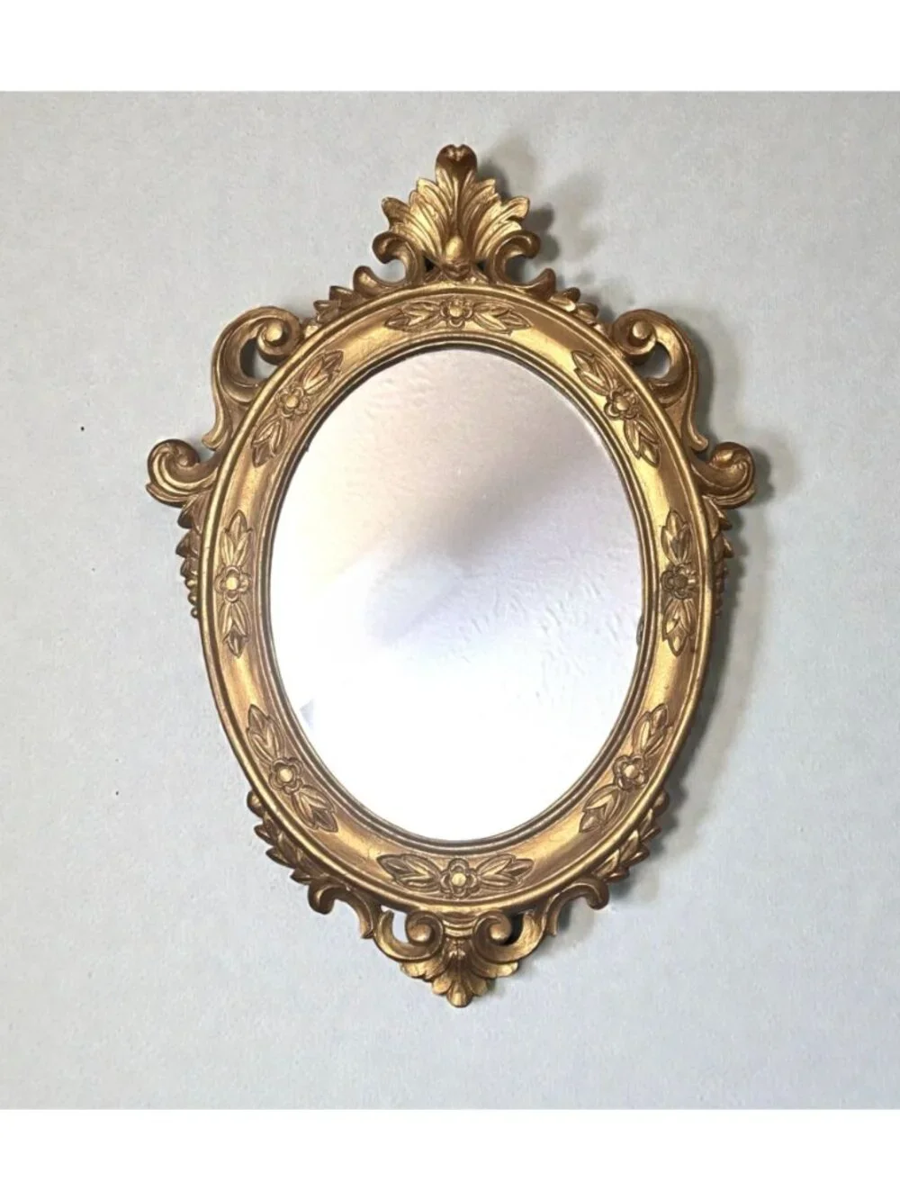 Ornate Gold Oval Mirror With Floral Details & Vintage Frame Design